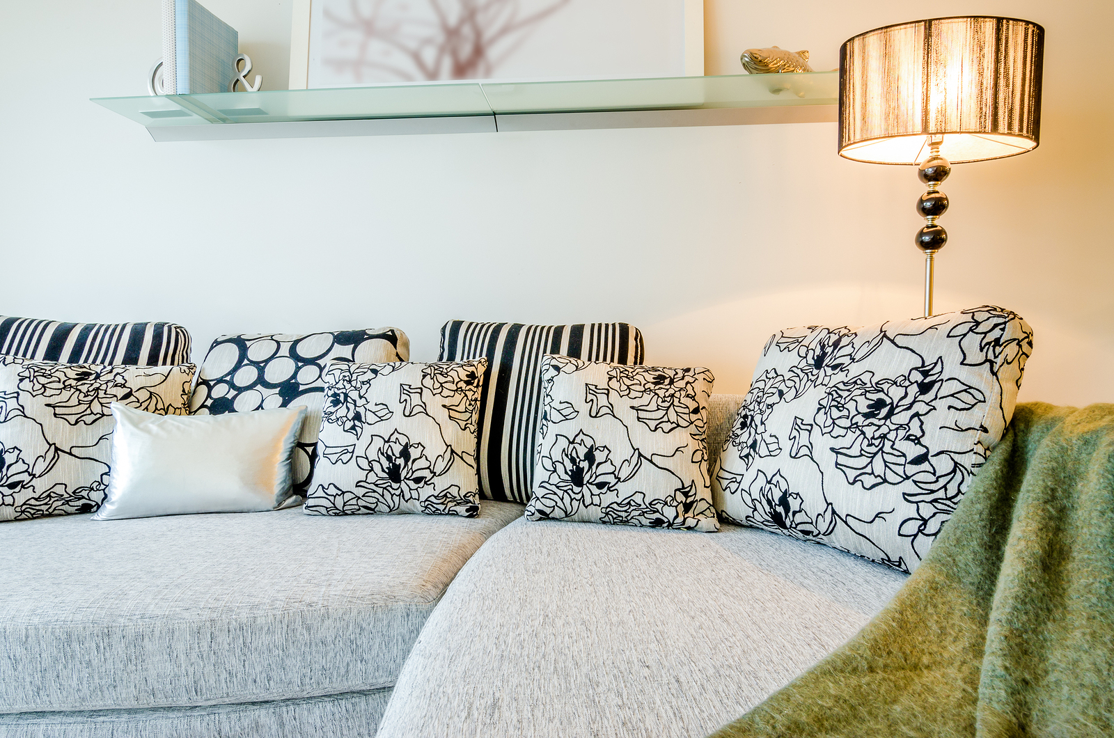 Living room Interior with couch, sofa and colorful designer cushions, pillows