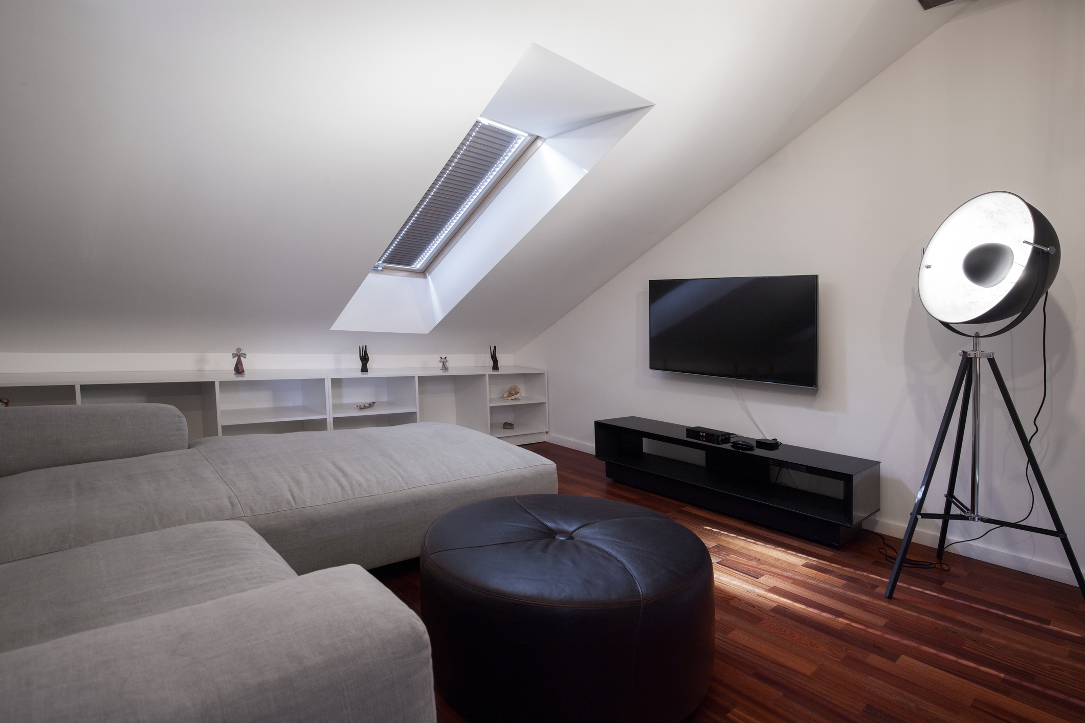 White cozy living room at the attic