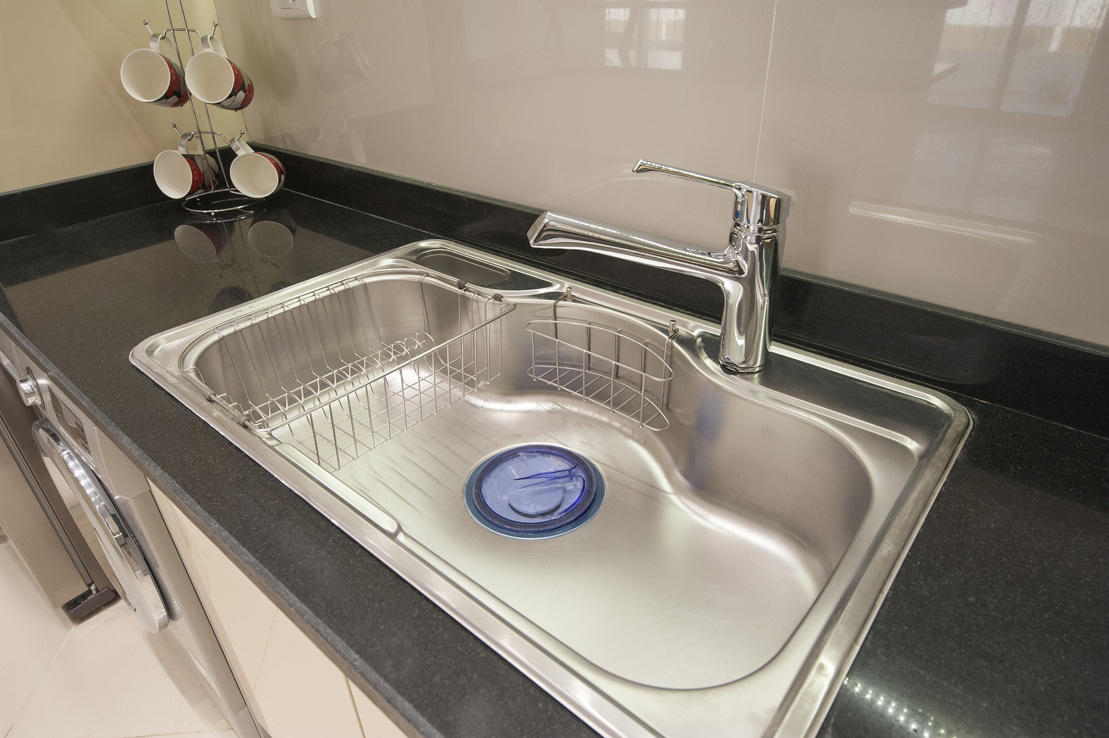 Interior design decor of kitchen in luxury apartment with sink and faucet