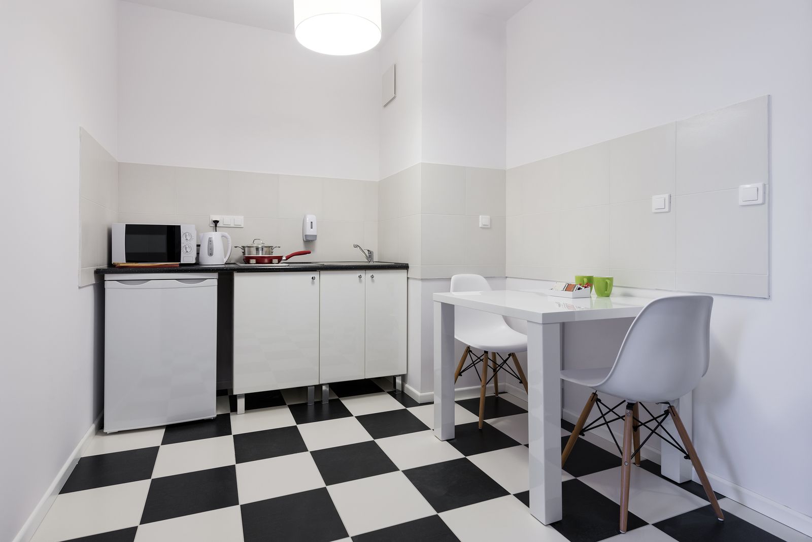 White and black small and compact kitchen interior design