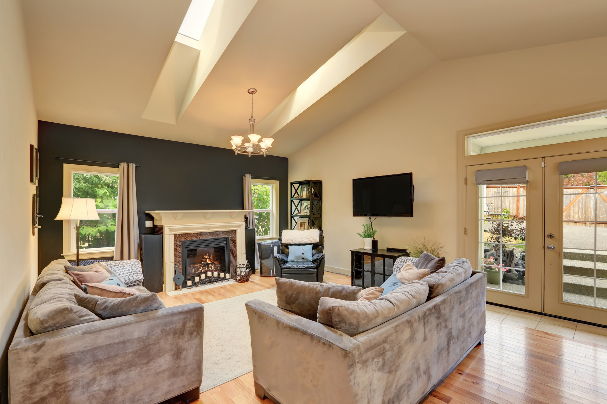 Classic American family room with fireplace and sofas