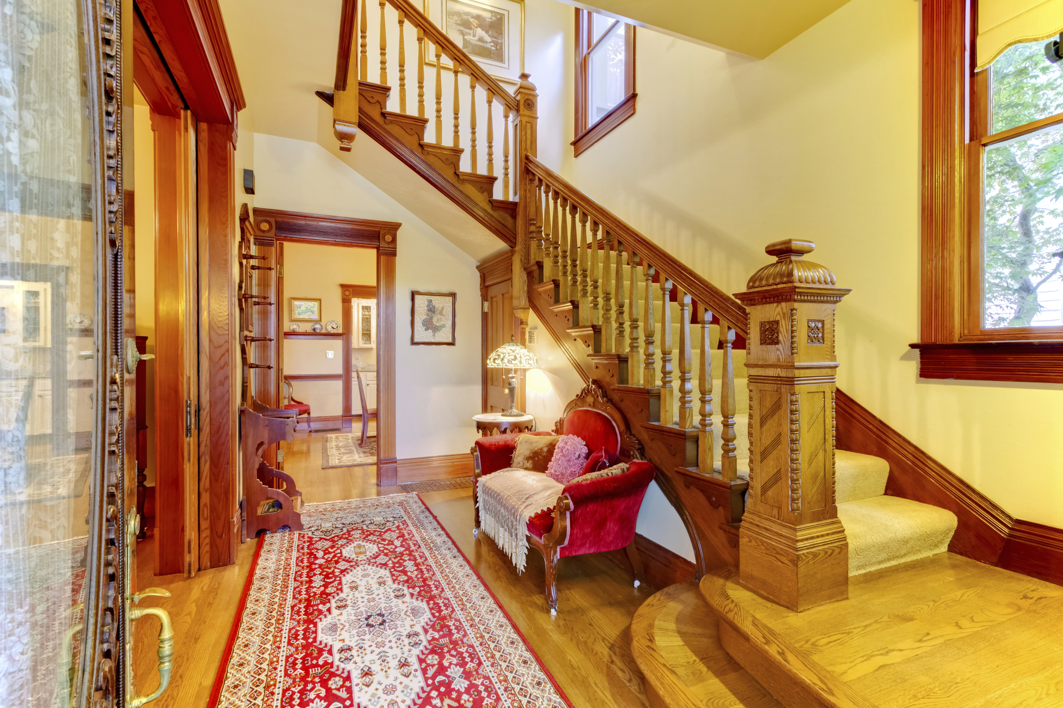 Bright hallway with colourful rug